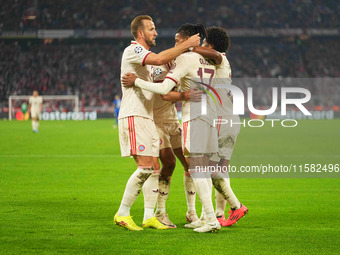 Michael Olise of Bayern Munich    celebrates  the teams sixth goal  during the Champions League Round 1 match between Bayern Munich v Dinamo...