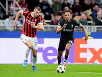 Strahinja Pavlovic of AC Milan and Trent Alexander-Arnold of Liverpool FC compete for the ball during the UEFA Champions League 2024/25 Leag...