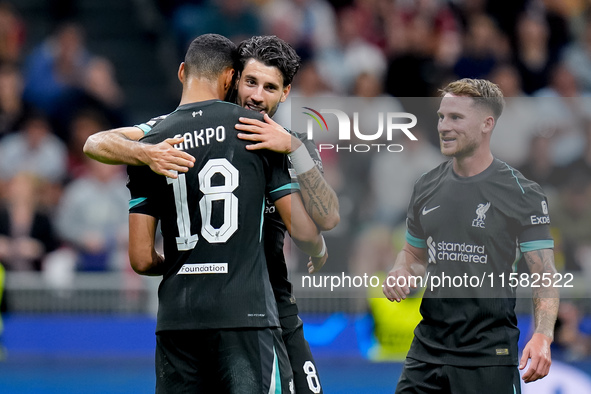 Dominik Szoboszlai of Liverpool FC celebrates with Cody Gakpo after scoring third goal during the UEFA Champions League 2024/25 League Phase...