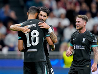 Dominik Szoboszlai of Liverpool FC celebrates with Cody Gakpo after scoring third goal during the UEFA Champions League 2024/25 League Phase...