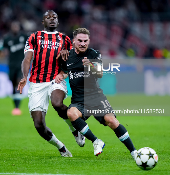 Alexis Mac Allister of Liverpool FC and Youssouf Fofana of AC Milan compete for the ball during the UEFA Champions League 2024/25 League Pha...