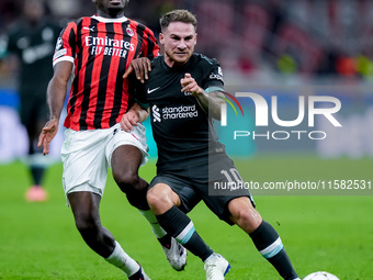 Alexis Mac Allister of Liverpool FC and Youssouf Fofana of AC Milan compete for the ball during the UEFA Champions League 2024/25 League Pha...