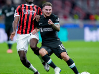 Alexis Mac Allister of Liverpool FC and Youssouf Fofana of AC Milan compete for the ball during the UEFA Champions League 2024/25 League Pha...