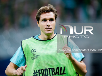 Federico Chiesa of Liverpool FC looks on during the UEFA Champions League 2024/25 League Phase MD1 match between AC Milan and Liverpool FC a...