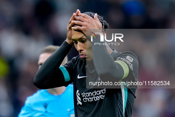 Virgil van Dijk of Liverpool FC reacts during the UEFA Champions League 2024/25 League Phase MD1 match between AC Milan and Liverpool FC at...