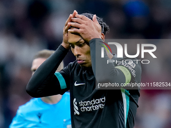 Virgil van Dijk of Liverpool FC reacts during the UEFA Champions League 2024/25 League Phase MD1 match between AC Milan and Liverpool FC at...