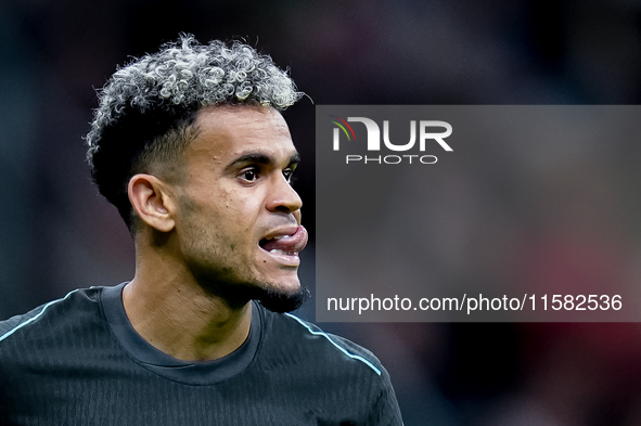 Luis Diaz of Liverpool FC reacts during the UEFA Champions League 2024/25 League Phase MD1 match between AC Milan and Liverpool FC at Stadio...