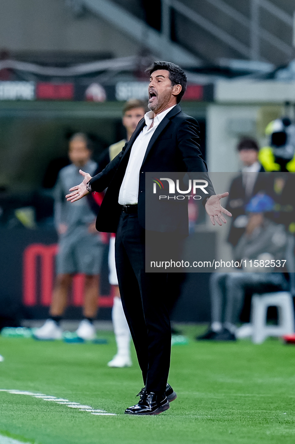 Paulo Fonseca head coach of AC Milan reacts during the UEFA Champions League 2024/25 League Phase MD1 match between AC Milan and Liverpool F...