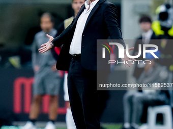 Paulo Fonseca head coach of AC Milan reacts during the UEFA Champions League 2024/25 League Phase MD1 match between AC Milan and Liverpool F...