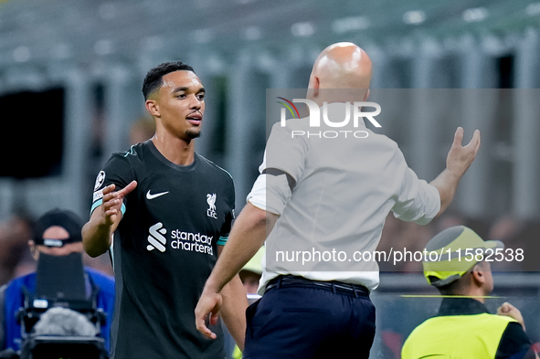 Trent Alexander-Arnold of Liverpool FC and Arne Slot head coach of Liverpool FC during the UEFA Champions League 2024/25 League Phase MD1 ma...