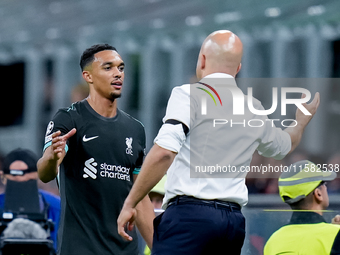 Trent Alexander-Arnold of Liverpool FC and Arne Slot head coach of Liverpool FC during the UEFA Champions League 2024/25 League Phase MD1 ma...