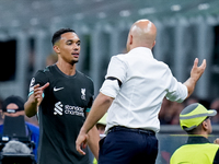 Trent Alexander-Arnold of Liverpool FC and Arne Slot head coach of Liverpool FC during the UEFA Champions League 2024/25 League Phase MD1 ma...