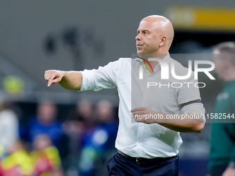 Arne Slot head coach of Liverpool FC gestures during the UEFA Champions League 2024/25 League Phase MD1 match between AC Milan and Liverpool...