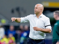 Arne Slot head coach of Liverpool FC gestures during the UEFA Champions League 2024/25 League Phase MD1 match between AC Milan and Liverpool...