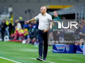 Arne Slot head coach of Liverpool FC gestures during the UEFA Champions League 2024/25 League Phase MD1 match between AC Milan and Liverpool...