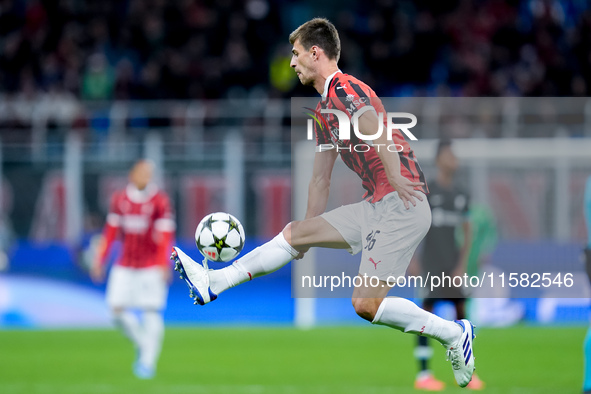 Matteo Gabbia of AC Milan controls the ball during the UEFA Champions League 2024/25 League Phase MD1 match between AC Milan and Liverpool F...