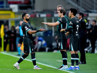 Federico Chiesa of Liverpool FC and Mohamed Salah of Liverpool FC during the UEFA Champions League 2024/25 League Phase MD1 match between AC...