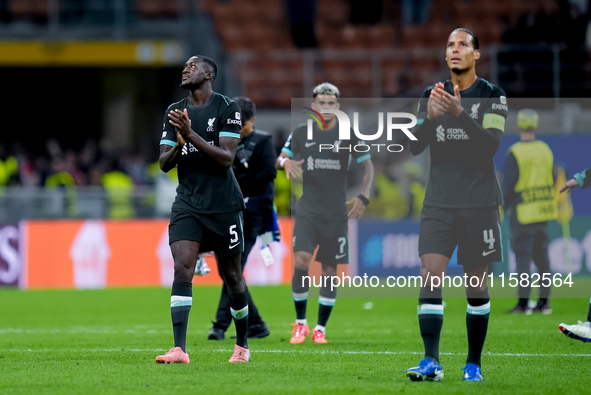 Ibrahima Konate' of Liverpool FC applauds his supporters during the UEFA Champions League 2024/25 League Phase MD1 match between AC Milan an...