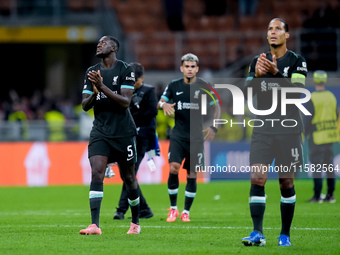 Ibrahima Konate' of Liverpool FC applauds his supporters during the UEFA Champions League 2024/25 League Phase MD1 match between AC Milan an...