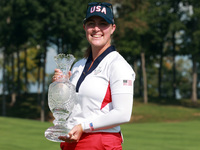 GAINESVILLE, VIRGINIA - SEPTEMBER 15: Lauren Coughlin of the United States holds the winning trophy on the 18th green at the conclusion of t...