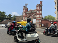 Traffic drives past the East Fort gateway in Thiruvananthapuram, Kerala, India, on April 2, 2024. (