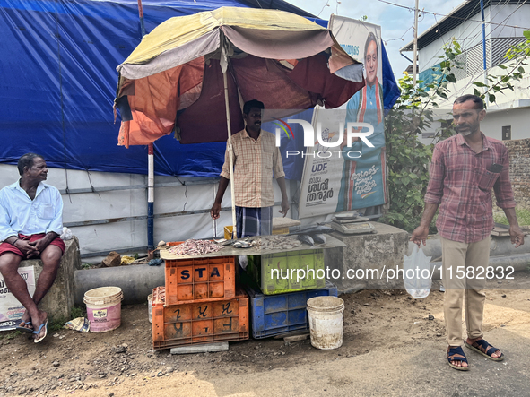 A man sells fish along the roadside in Ambalathara, Thiruvananthapuram (Trivandrum), Kerala, India, on April 14, 2024. 