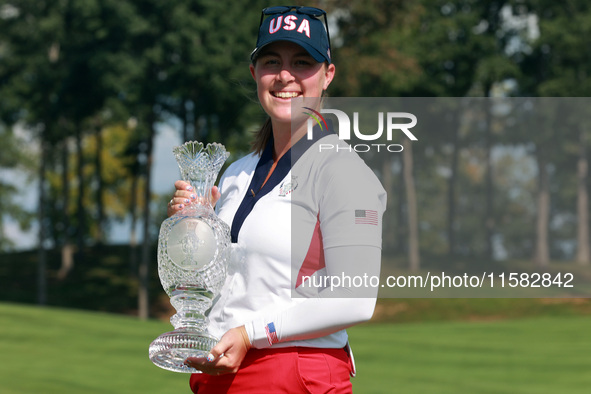 GAINESVILLE, VIRGINIA - SEPTEMBER 15: Jennifer Kupcho of the United States holds the winning trophy on the 18th green at the conclusion of t...