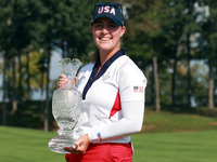 GAINESVILLE, VIRGINIA - SEPTEMBER 15: Jennifer Kupcho of the United States holds the winning trophy on the 18th green at the conclusion of t...