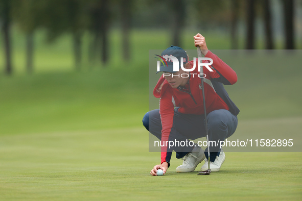 GAINESVILLE, VIRGINIA - SEPTEMBER 13: Sarah Schmelzel of the United States lines up her putt on the second green during Foursome Matches on...