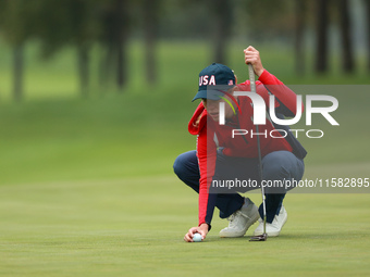 GAINESVILLE, VIRGINIA - SEPTEMBER 13: Sarah Schmelzel of the United States lines up her putt on the second green during Foursome Matches on...