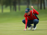 GAINESVILLE, VIRGINIA - SEPTEMBER 13: Sarah Schmelzel of the United States lines up her putt on the second green during Foursome Matches on...