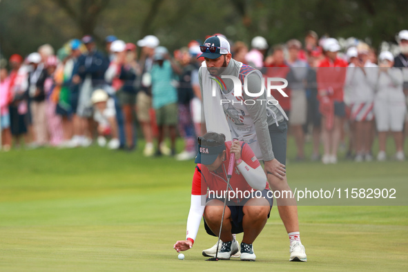 GAINESVILLE, VIRGINIA - SEPTEMBER 13: Lilia Vu of Team USA lines up her putt on the third green during Foursome Matches on Day One of the So...