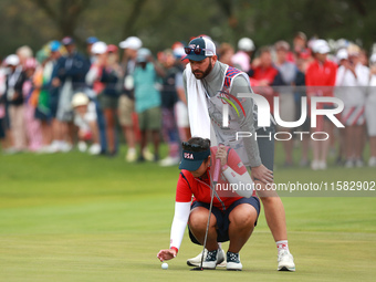 GAINESVILLE, VIRGINIA - SEPTEMBER 13: Lilia Vu of Team USA lines up her putt on the third green during Foursome Matches on Day One of the So...