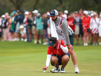 GAINESVILLE, VIRGINIA - SEPTEMBER 13: Lilia Vu of Team USA lines up her putt on the third green during Foursome Matches on Day One of the So...