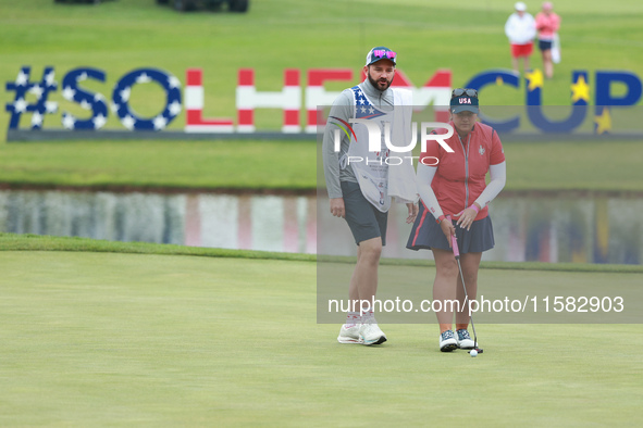 GAINESVILLE, VIRGINIA - SEPTEMBER 13: Lilia Vu of Team USA lines up her putt on the 4th green during Foursome Matches on Day One of the Solh...