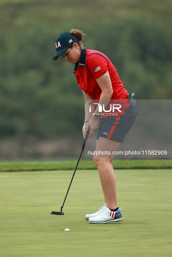 GAINESVILLE, VIRGINIA - SEPTEMBER 13: Lauren Coughlin of the United States plays her putt on the 11th green during Foursome Matches on Day O...