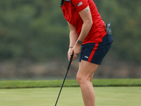 GAINESVILLE, VIRGINIA - SEPTEMBER 13: Lauren Coughlin of the United States plays her putt on the 11th green during Foursome Matches on Day O...