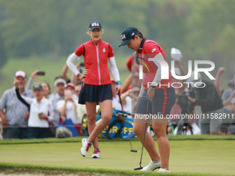 GAINESVILLE, VIRGINIA - SEPTEMBER 13: Allisen Corpuz of the United States plays her putt on the 16th green during Foursome Matches on Day On...