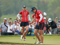 GAINESVILLE, VIRGINIA - SEPTEMBER 13: Allisen Corpuz of the United States plays her putt on the 16th green during Foursome Matches on Day On...