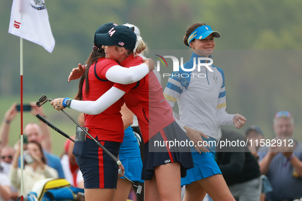 GAINESVILLE, VIRGINIA - SEPTEMBER 13: Allisen Corpuz of the United States is congratulated by teammate Nelly Korda after making the winning...