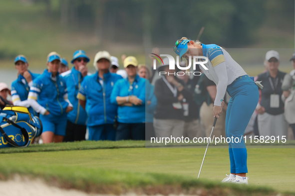 GAINESVILLE, VIRGINIA - SEPTEMBER 13: Emily Kristine Pedersen of Team Europe plays her putt on the 16th green during Foursome Matches on Day...