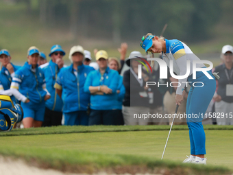 GAINESVILLE, VIRGINIA - SEPTEMBER 13: Emily Kristine Pedersen of Team Europe plays her putt on the 16th green during Foursome Matches on Day...