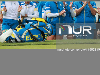 GAINESVILLE, VIRGINIA - SEPTEMBER 13: Some members of Team Europe cheer at the 16th green after Emily Kristine Pedersen’s putt during Fourso...