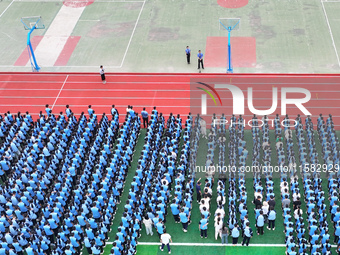 Prosecutors organize a ''9.18'' patriotic education activity on the campus of No. 1 Middle School in Lianyungang, China, on September 18, 20...