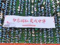 Prosecutors organize a ''9.18'' patriotic education activity on the campus of No. 1 Middle School in Lianyungang, China, on September 18, 20...