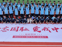 Prosecutors organize a ''9.18'' patriotic education activity on the campus of No. 1 Middle School in Lianyungang, China, on September 18, 20...