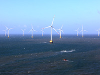 Wind turbines stand in the sea and rotate continuously at Pingtan Comprehensive Experimental Zone in Fujian, China, on September 17, 2024. (