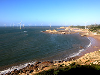 Wind turbines stand in the sea and rotate continuously at Pingtan Comprehensive Experimental Zone in Fujian, China, on September 17, 2024. (