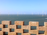 Wind turbines stand in the sea and rotate continuously at Pingtan Comprehensive Experimental Zone in Fujian, China, on September 17, 2024. (