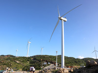 Wind turbines stand in the sea and rotate continuously at Pingtan Comprehensive Experimental Zone in Fujian, China, on September 17, 2024. (